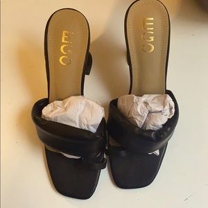 Never worn and still in its box